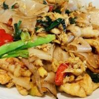 Drunken Noodles · Flat rice noodles, stir fried with thai chilis, thai basil, eggs, onions, red bell peppers, ...