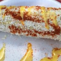Elote · Corn on the cob prepared with mayo, butter, chile, cheese, limon.