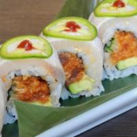 Seared Yellowtail Roll · In: spicy tuna, avocado and cucumber. Out: lightly seared yellowtail and thinly sliced jalap...