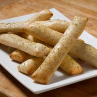 Breadsticks · Garlic seasoned breadsticks.