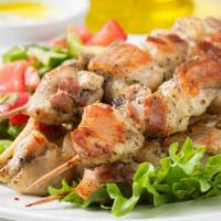 Chicken Kabob Salad · Fresh salad made with Chicken Kabob, lettuce, tomato, cucumber, onion and crazy sauce.
