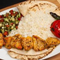 #11 Chicken Kabob Boneless · Juicy Chicken Pieces - Served with Rice, Pita Bread, Shirazi Salad, Grilled Tomatoes and Pep...