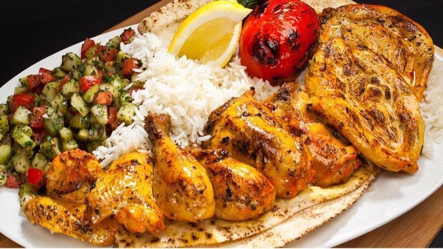 #15 Cornish Game Hen · Whole Cornish Game Hen served with Rice, Pita Bread, Shirazi Salad, Grilled Tomatoes and Peppers