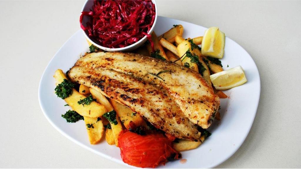 #17D Swai Fish Filet · Boneless and Skinless Swai Fish Filet served with Garlic Fries and Red Cabbage Salad, Pita Bread, Grilled Tomatoes and Peppers