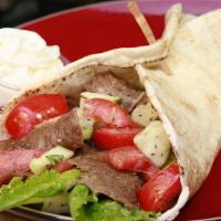 #1 Gyros Pita Wrap · Thinly sliced Gyro meat (beef & lamb)