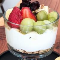 Parfait · Greek yogurt, granola, sliced almond, fresh fruits,  dried cranberry and honey