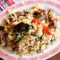 Green Curry Fried Rice · Jasmine rice, green curry paste, fresh chiles and thai basil.