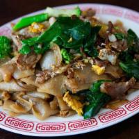 Pad Zee Ew · Broad rice noodles stir-fried with egg, chinese broccoli, salted soybean paste, light and da...