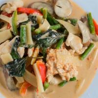 Red Curry · Red curry paste derived from Thai red chilis, cooked in coconut milk, with egg plant, bamboo...