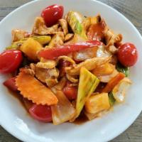 Sweet & Sour Chicken · Sliced chicken breast sautéed with onions, bell peppers, pineapples, carrots, and tomatoes.
