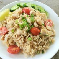 Thai Fried Rice · Chicken, pork, beef, or veggies stir-fried with onions, tomatoes, egg, peas, and carrots.