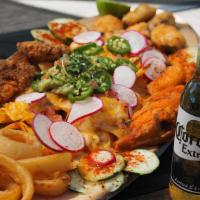 Kings Sampler · FEEDS 3-5 Get the Party Started with 2 FOOT Platter of Nachos, Onion Rings, Chicken Strips, ...