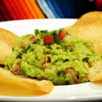 Guacamole & Chips · Freshly made guacamole, crafted from avocado, tomatoes, cilantro, onions, lime juice, salt a...