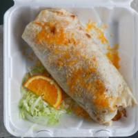 Mega Wet Burrito · Your choice of meat, beans, rice, fajita vegetables, cheese, guacamole, and sour cream. Cove...
