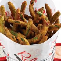 Crispy Green Beans · Light and crispy breaded green beans served with Buffalo ranch, Honey mustard, and Ranch dip...