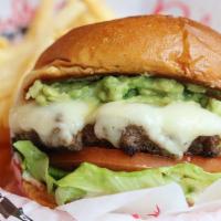 Guacamole Burger · Topped with a generous portion of our housemade guacamole, two slices of Swiss cheese, crisp...