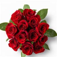 Dozen Long Stem Red Roses  · Dozen roses wrapped in clear cellophane.