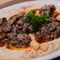 Hummus With Meat · Ground garbanzo beans with special seasonings and marinated ground beef.
