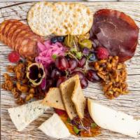 Cheese & Charcuterie · Chef's selection of charcuterie and cheeses from all over the world, served with crostini, m...