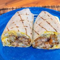 Breakfast Burrito · soft scrambled eggs, swiss cheese, green salsa, crispy tater tots, cotija cheese with your c...