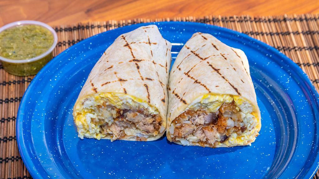 Breakfast Burrito · soft scrambled eggs, swiss cheese, green salsa, crispy tater tots, cotija cheese with your choice of protein