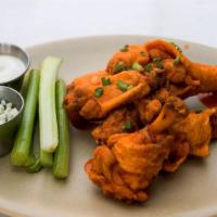 Beer Brined Chicken Wings · Buffalo sauce, bleu cheese, celery, ranch.