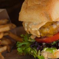 Tavern Burger · Thousand island dressing, tomatoes, lettuce, onions, pickles.