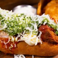 Meatball Sandwich · Hoagie roll, herb tomato sauce, mozzarella cheese, pesto.