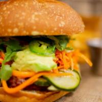 Bánh Mi Impossible Burger · Vegan burger patty, pickled carrots and cucumbers, jalapeños, avocado, cilantro, Asian BBQ s...