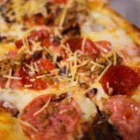 Tavern Combo · Pepperoni, calabrian salami, pork sausage, bacon, tomato sauce, mozzarella and parmesan chee...