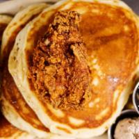 Tavern Fried Chicken 'N Pancakes · Fluffy pancakes, bourbon-jalapeño syrup, pecan butter.