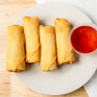 A-4 Egg Rolls · Crispy, golden-brown veggie egg rolls served with sweet and sour dipping sauce.