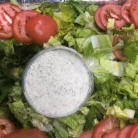 Garden Salad · Fresh romaine lettuce, diced tomato, cucumber, and Parsley ,Olive,lemon,Olive oil,Green Pepper