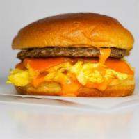 Brioche, Impossible Sausage, Egg, & Cheddar Sandwich · Delicious vegetarian option for your savory breakfast sandwich. 2 scrambled eggs, melted Che...