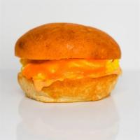 Kaiser Roll, Egg, & Cheese Sandwich · 2 scrambled eggs, melted cheese, and Sriracha aioli on a warm kaiser roll.