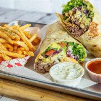 Steak California Kabob Wrap  · Romaine lettuce, tomato, onion, guacamole, shoestring french fries, pickled turnip, topped w...