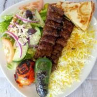 Koobideh Kabob Plate · Beef Blend Marinated, Grilled Pepper & Tomato, Saffron Herb Rice – Served with side salad an...