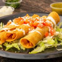 Taquitos Dorados Combo  · Your choice of chicken, beef, or papas sorry no mixing. Includes rice and Beans