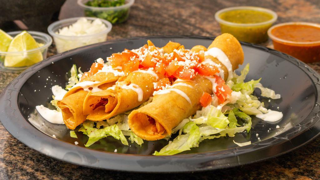 Taquitos Dorados Combo  · Your choice of chicken, beef, or papas sorry no mixing. Includes rice and Beans