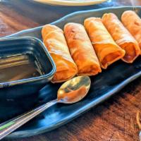 Egg Roll · Savory crispy roll filled with vegetable. Served with plum sauce.