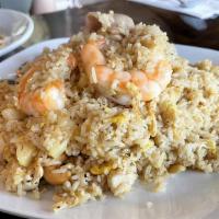 Pineapple Fried Rice · Yummy fried rice with hint of curry and pineapple, cashew nut, combinations shrimp, pork and...