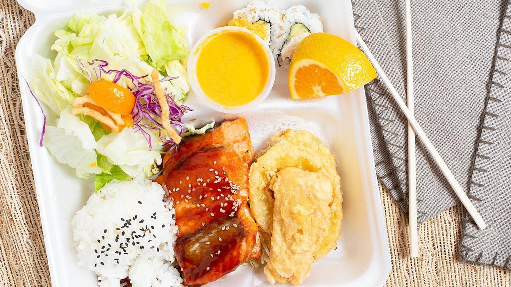 Salmon Teriyaki · Served with salad rice tempura and two pieces cal roll.