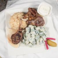 Lamb Kebab Pita Pocket · Lamb, hummus, lettuce, pickles, mediterranean salad and tahini.