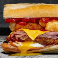Fat Breakfast. · Fried Eggs | Ham | Crisp Bacon | Breakfast Sausage | Mozzarella Sticks | Melted American | T...