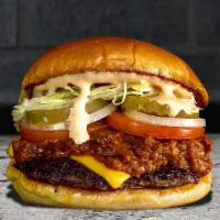 Chili Cheeseburger. · 1/4 Pound USDA Certified Black Angus Beef | Chili | 
American Cheese | Shredded Lettuce | To...