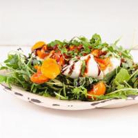 Burrata Caprese Salad · Organic Baby Arugula, Oven Roasted Grape Tomato, Fresh basil, Olive Oil & Balsamic Glaze.