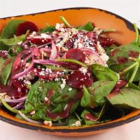 Beet Spinach Salad · Organic Baby Spinach, Red Onions, Feta Cheese, Fresh Mint & Roasted Almonds.