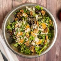 Oh Baby (Family Size) · Mixed baby greens with homemade candied walnuts, juicy mandarin orange slices and aged gorgo...