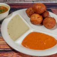 Mysore Bonda · Deep fried sourdough balls.