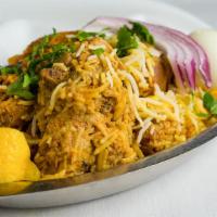 Chicken Dum Biryani · Basmati rice cooked in dum method with mildly spiced tender chicken and flavored with aromat...